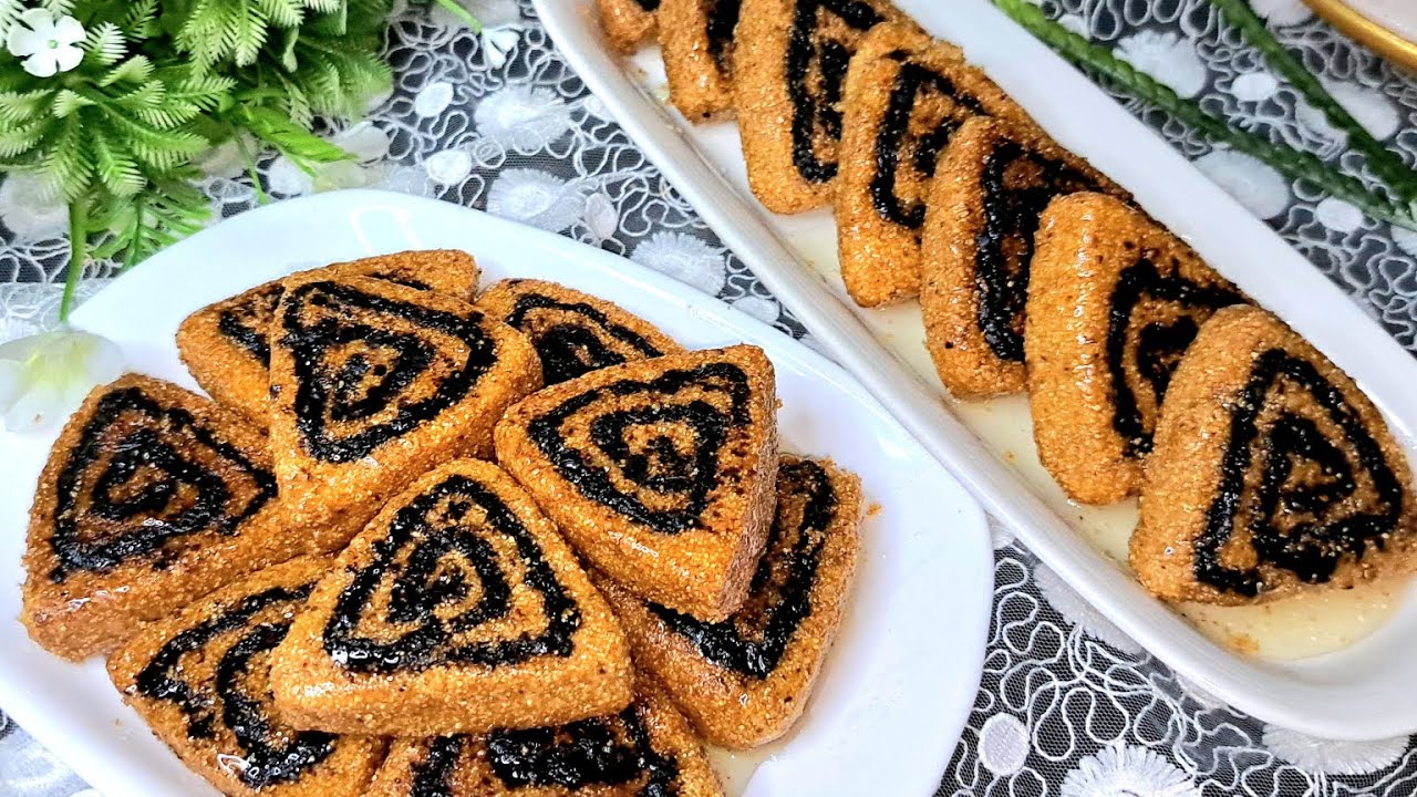 وصفة المقروط رولي المقلي بالتمر :"روعة الذوق: اكتشف سر تحضير المقروط رولي المقلي بالتمر الجزائري"