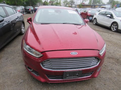 IAAI-ის ავტო აუქციონზე ვიყიდეთ Ford Fusion Hybrid 2014 Titanium მცირე დაზიანებით