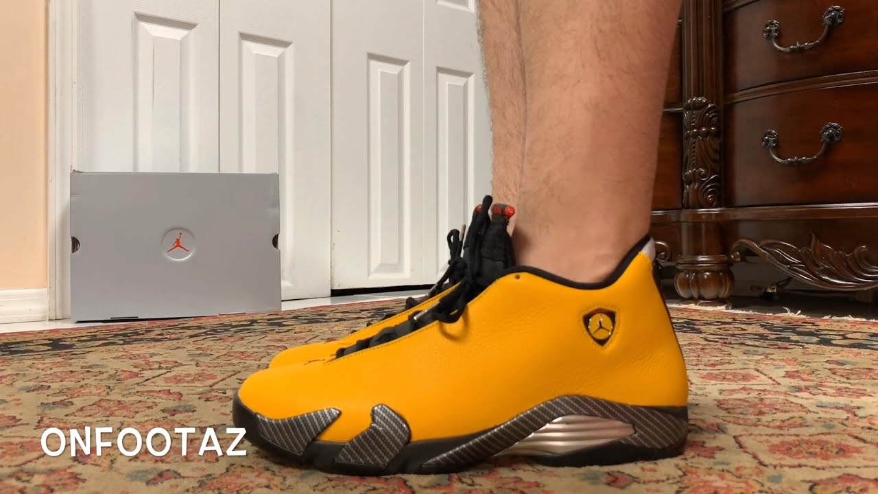 yellow ferrari 14s on feet