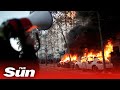 Live: Protesters launch fireworks at police in Paris