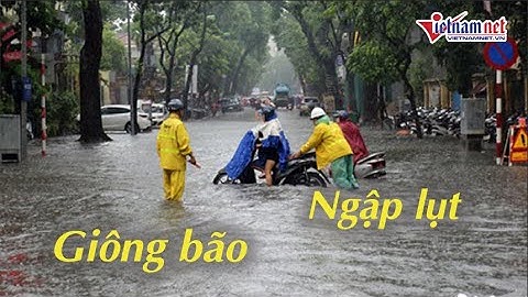 Hà Nội bất ngờ mưa lớn, nhiều tuyến phố ngập lụt | Tin tức Vietnamnet