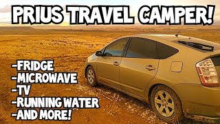 Toyota Prius converted into camper with fridge, microwave, running water, climate control & more