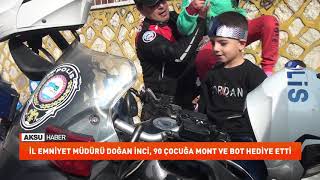 İl Emniyet Müdürü Doğan İnci, 90 çocuğa mont ve bot hediye etti