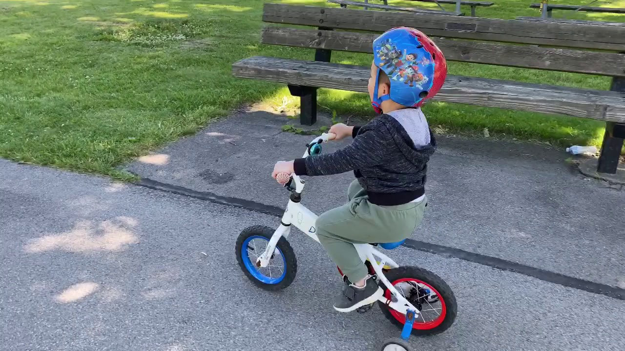 Practicing riding his tricycle YouTube