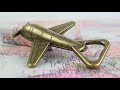 Let the Adventure Begin Airplane Bottle Opener by Kate Aspen