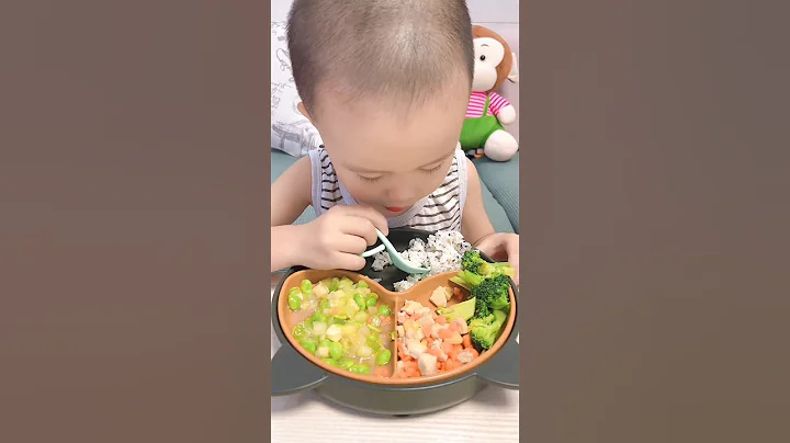 Baby eating rice with spoon #shorts #babyeating #eatingrice