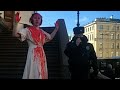 Russian Artist Doused In Fake Blood In Anti-War Protests