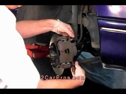 How to replace front rotors on 2004 honda civic #5