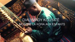 🇲🇱Djeli Dialymady Kouyaté montre la kora🪕aux enfants👧👩🏾👱👱🏾‍♂️😍