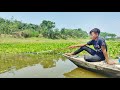 Amazing fishings  little boy catching fish by fish hook in village river fishing boat