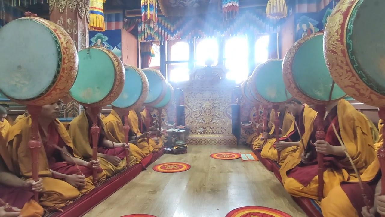 Buddhist Monks Playing Traditional Drums of Ritual