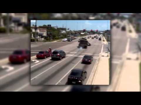SNN:  Heart Stopping Video of Dump Truck Running Red Light