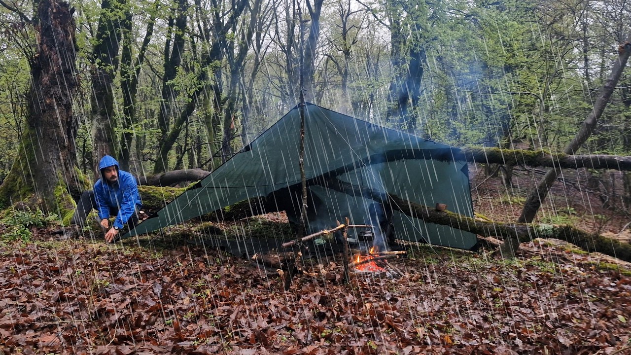 Caught in Heavy Rain & Thunderstorm; Building a Warm Survival Shelter ...