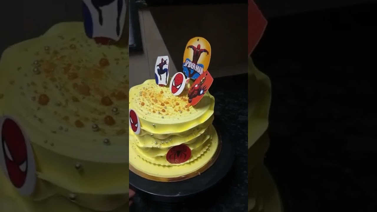 pineapple cake and sticker Spider-Man cake