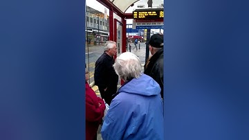 Hilarious argument between two old English people at a bus stop