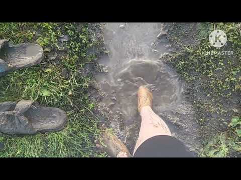 flip flop slippers and barefoot in mud