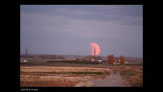 Lunar Eclipse Rising Sep 27, 2015  by Larry McNish