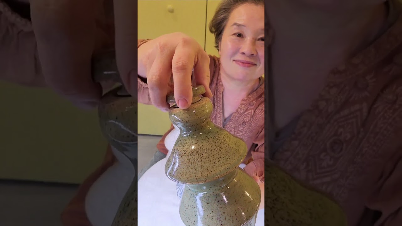 A clay screw cap jar with  new glaze,Just out of kiln.