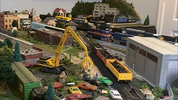 Ho scale train layout update. Coal mine, houses, mountain and more!