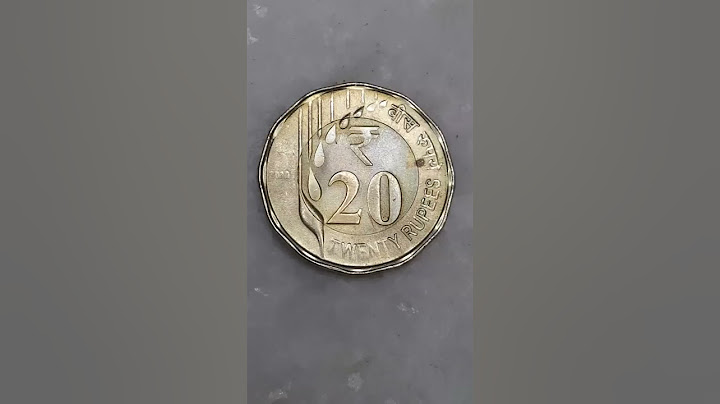New 20 rupees coin VS water drop.