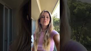 girl dancing on balcony
