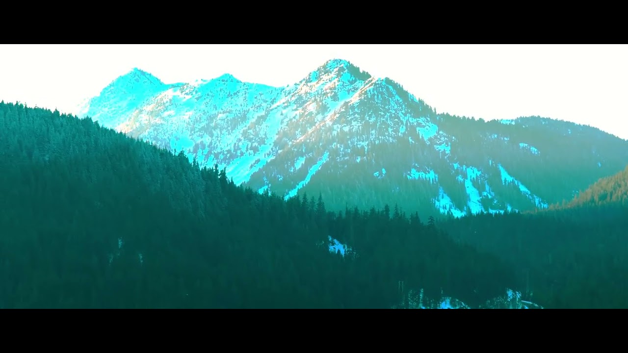 Smooth Aerial shot of the Cascade mountain range near HW-2, Washington State using a DJI Mavic 4 Pro