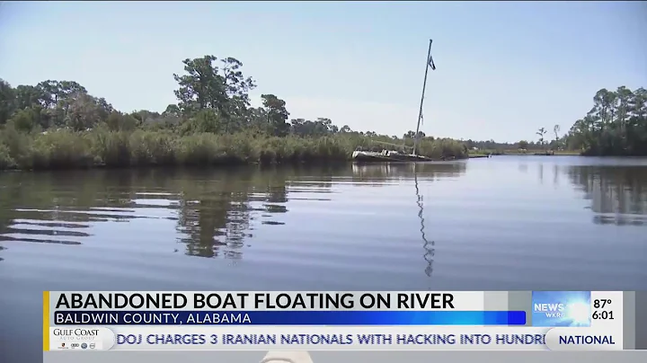 Abandoned sailboat in Bon Secour River causing con...
