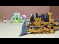 Rc bulldozer pushing Stone.