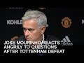 Jose mourinho reacts angrily to questions after tottenham loss