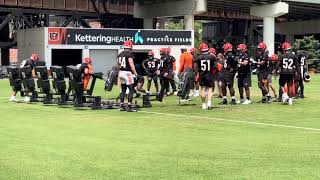 Bengals DL coach Marion Hobby works his line in heat Tuesday, including Sheldon Rankins 98