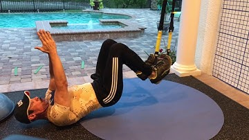 TRX Hamstring curl with hands above your head