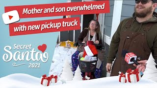 Mom in wheelchair cries, son overwhelmed when a Secret Santa gives them a pickup truck