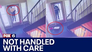Postal worker caught on cam not handling package with care | FOX6 News Milwaukee