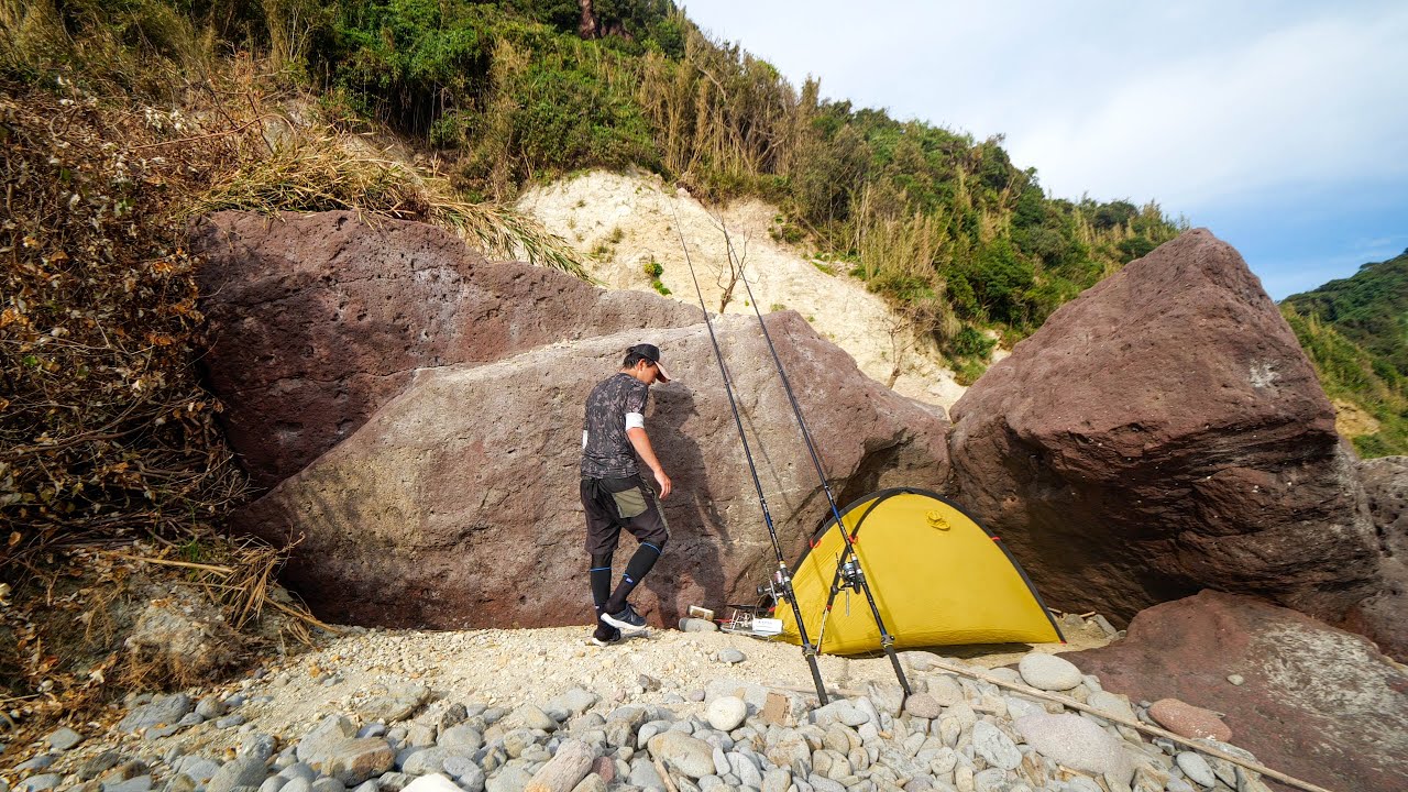 Discovering a secret spot under the cliff. Summer fishing camp in