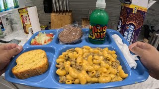 Information POV 4k Recreating 1990s School Cafeteria Lunch Mac and cheese with garlic bread News