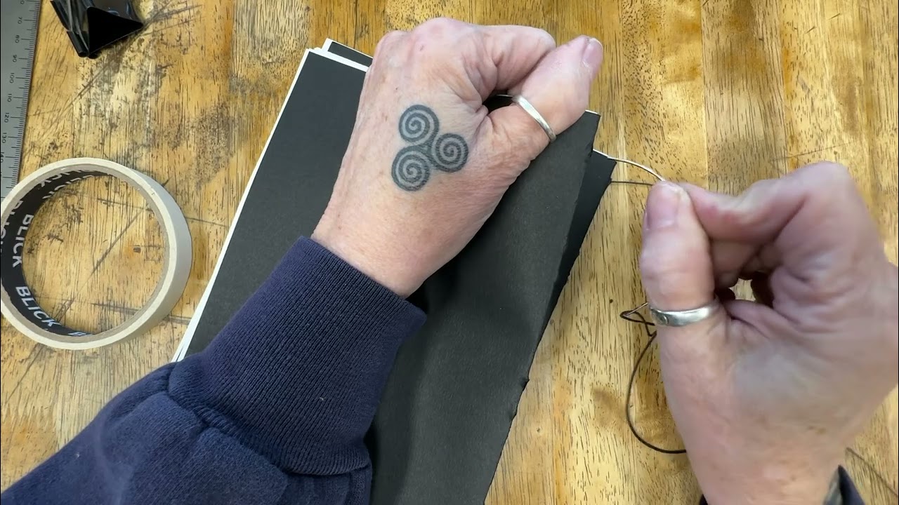 Making a french link stitch sketchbook; part 7, stitching.