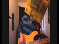 Playing "Marmaduke" on bass tilted on his left wearing a yellow TV