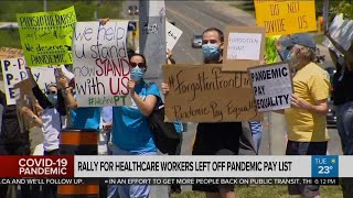Rally for healthcare workers left off pandemic pay list
