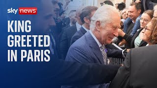 King greeted in Paris with shouts of 'Vive le Roi!' King greeted in Paris with shouts of 'Vive le Roi!'