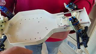 RC10 CE part 7 rebuild big bore shocks & nose supports in stalled