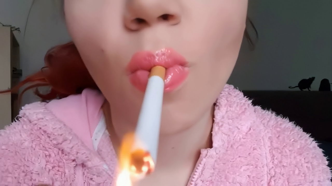 Woman smoking close up