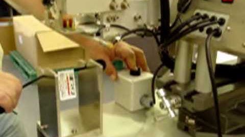 Semi-Automatic Label Applicator applying labels to wire