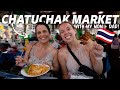 American parents shop at thailands largest weekend market