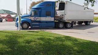 Trucks pulling into a Truck Stop.