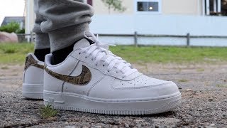 air force 1 ivory snake on feet