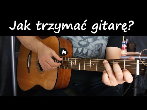 Wideo: Jak Trzymać Gitarę