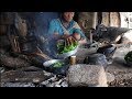 Cooking way of  organic green vegetables and food of maize flour in traditional way