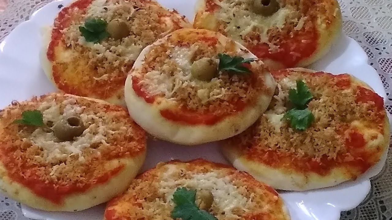 وصفة ميني بيتز بكيلة صغيرة  بعجينة سحرية  واقتصادية  وعجينة طرية وخفيفة  بزاف