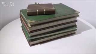 hidden box in a stack of books