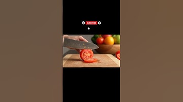 Sharp knife cuts Tomatoes